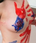 Ravon covers her tight teen body with finger paint and then rinses off